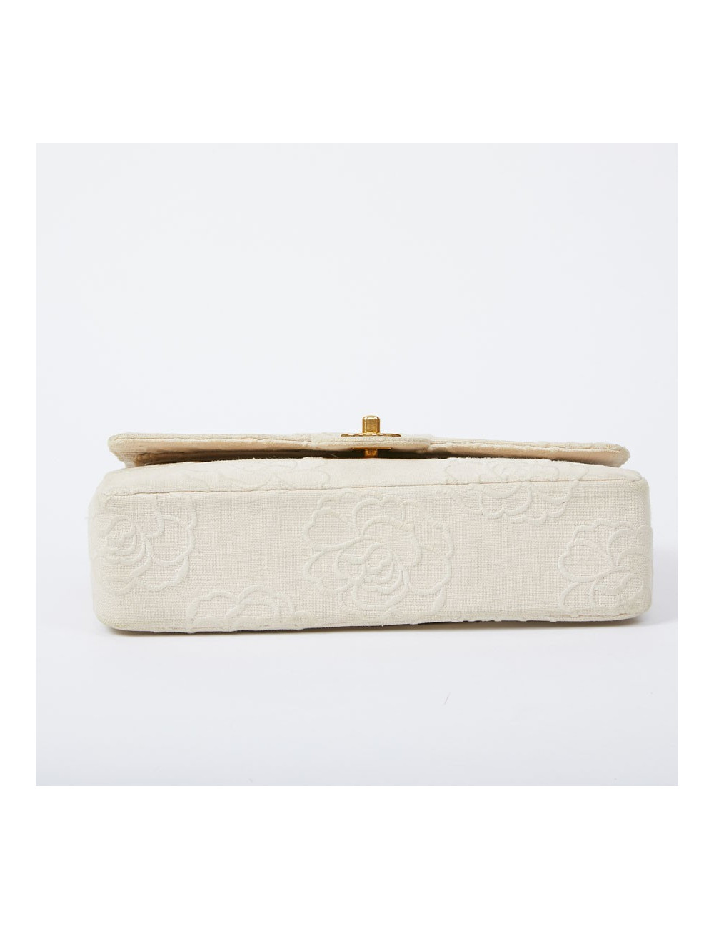 A NETTOYERSac motifs camélias CHANEL toile beige