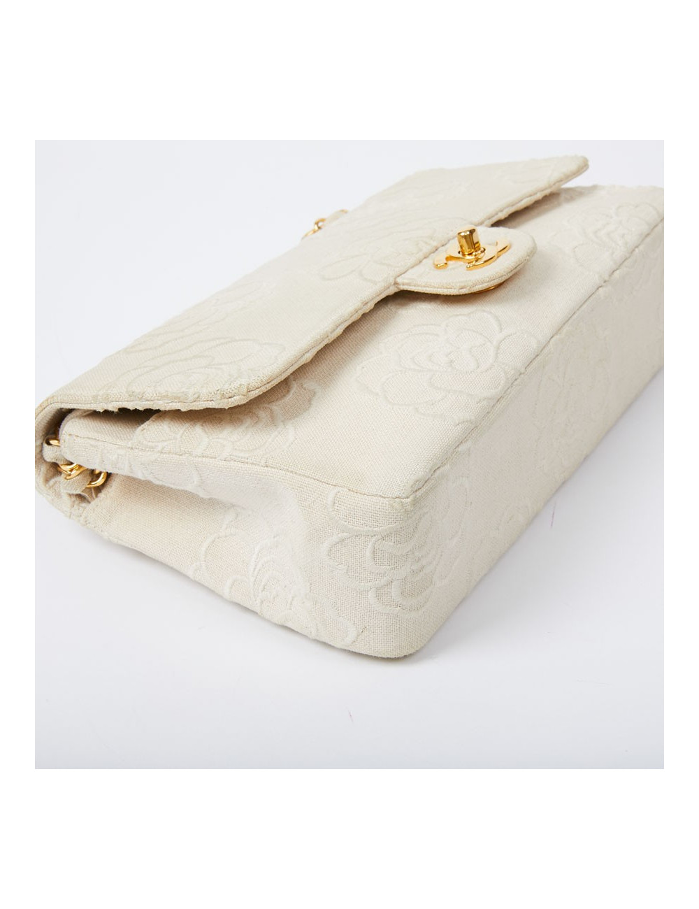 A NETTOYERSac motifs camélias CHANEL toile beige