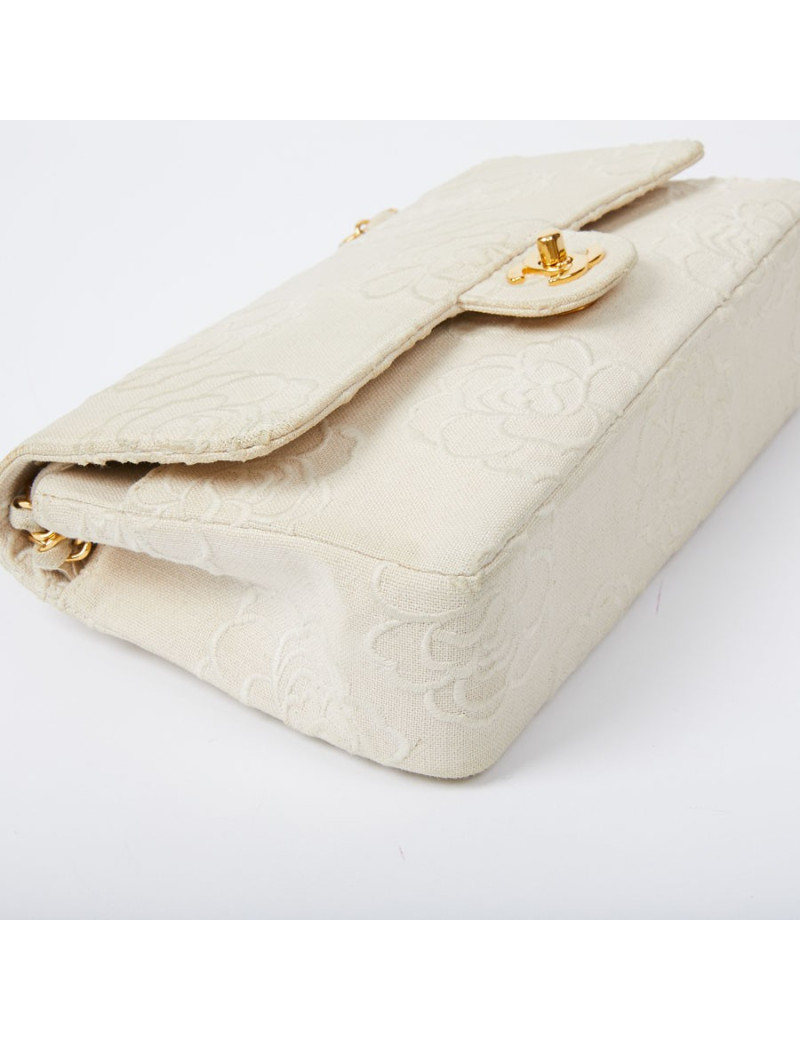 A NETTOYERSac motifs camélias CHANEL toile beige
