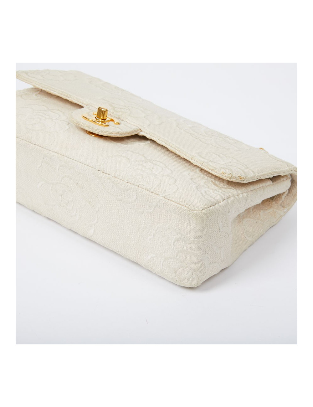 A NETTOYERSac motifs camélias CHANEL toile beige
