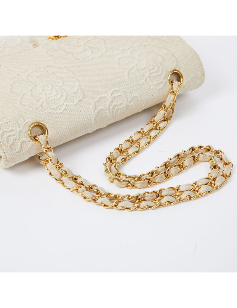  Sac CHANEL motifs camélias en toile beige