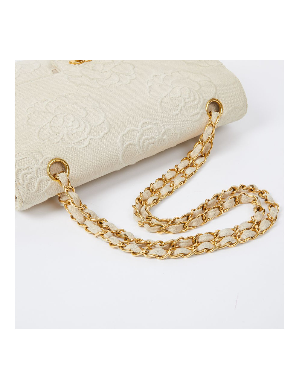 A NETTOYERSac motifs camélias CHANEL toile beige