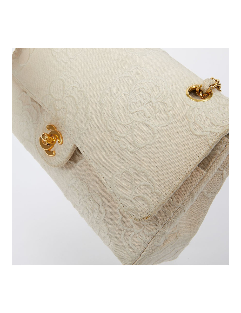 A NETTOYERSac motifs camélias CHANEL toile beige