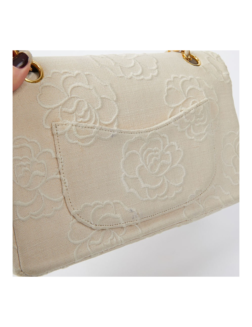A NETTOYERSac motifs camélias CHANEL toile beige