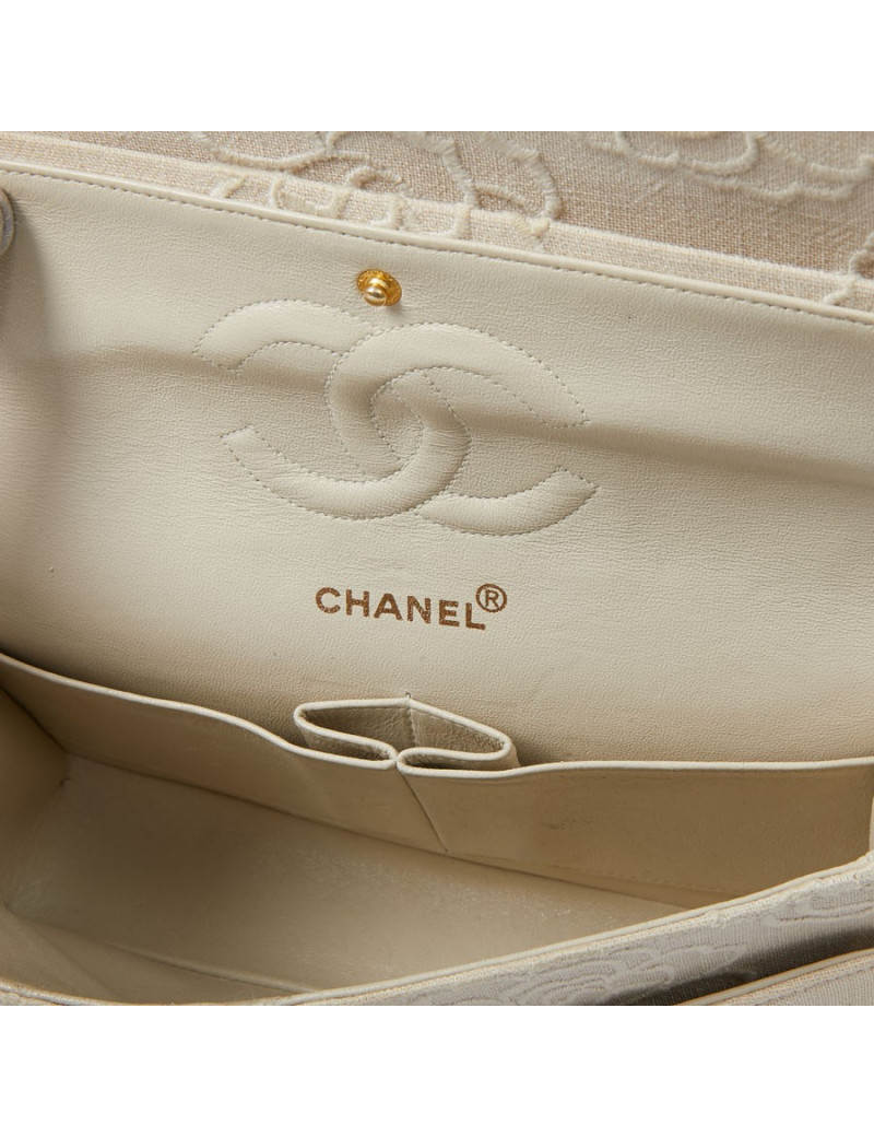  Sac CHANEL motifs camélias en toile beige