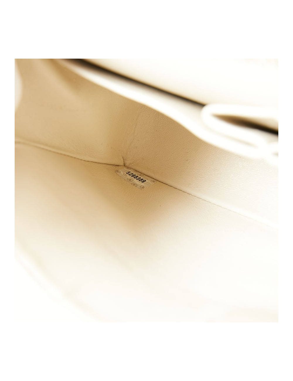 A NETTOYERSac motifs camélias CHANEL toile beige