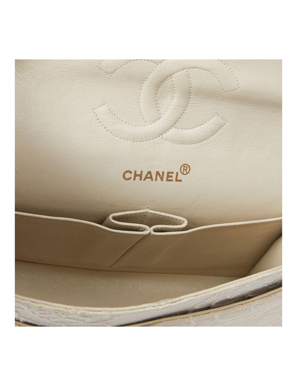 A NETTOYERSac motifs camélias CHANEL toile beige