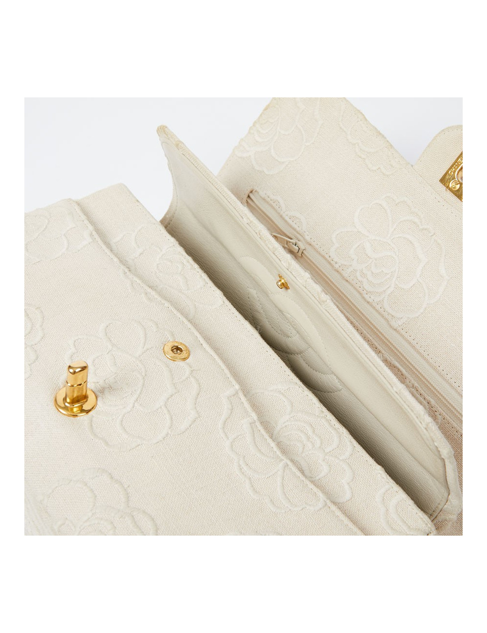 A NETTOYERSac motifs camélias CHANEL toile beige