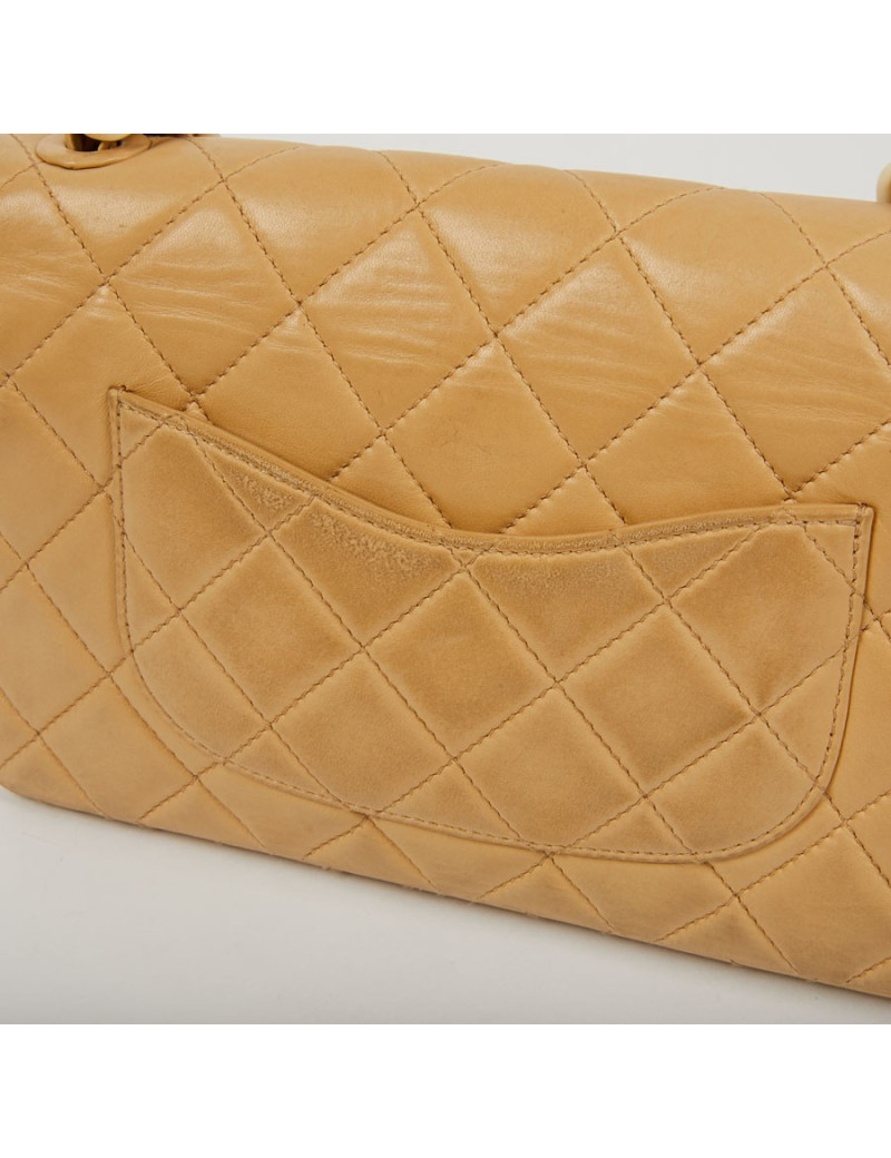 Sac CHANEL cuir d'agneau beige et bijouterie façon ivoire