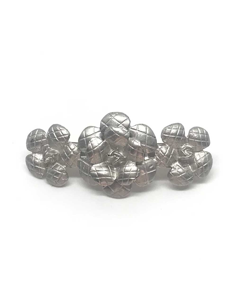 Barrette CHANEL camélias argent strié