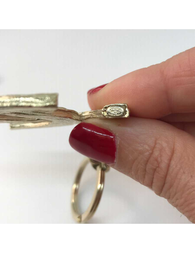 Porte-clefs CHANEL métal doré CC