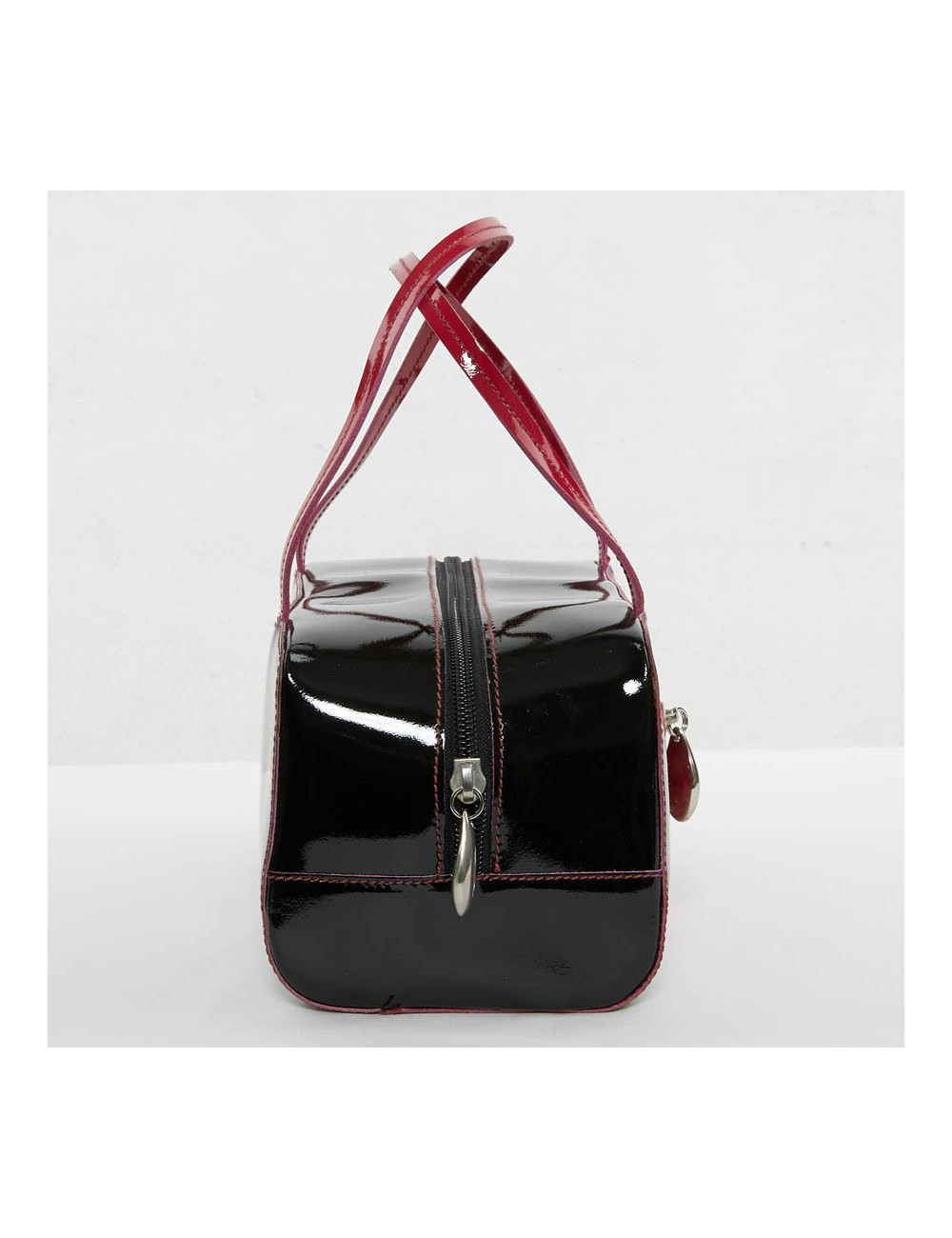 Sac LAGERFELD cuir verni noir poignée fuschia