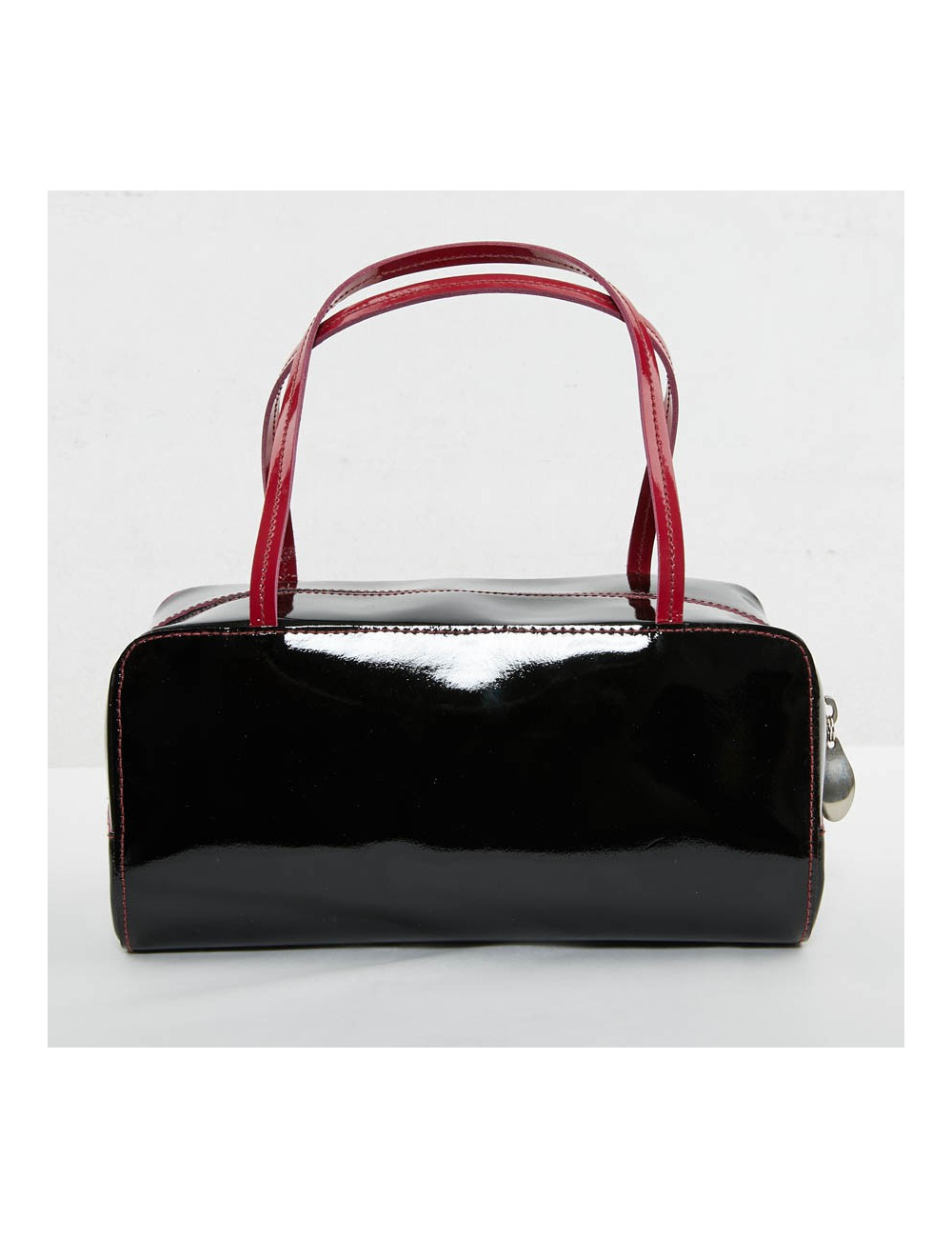 Sac LAGERFELD cuir verni noir poignée fuschia