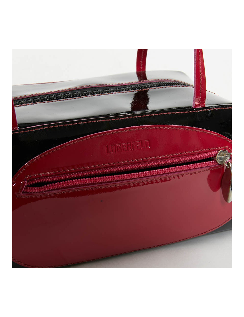Sac LAGERFELD cuir verni noir poignée fuschia