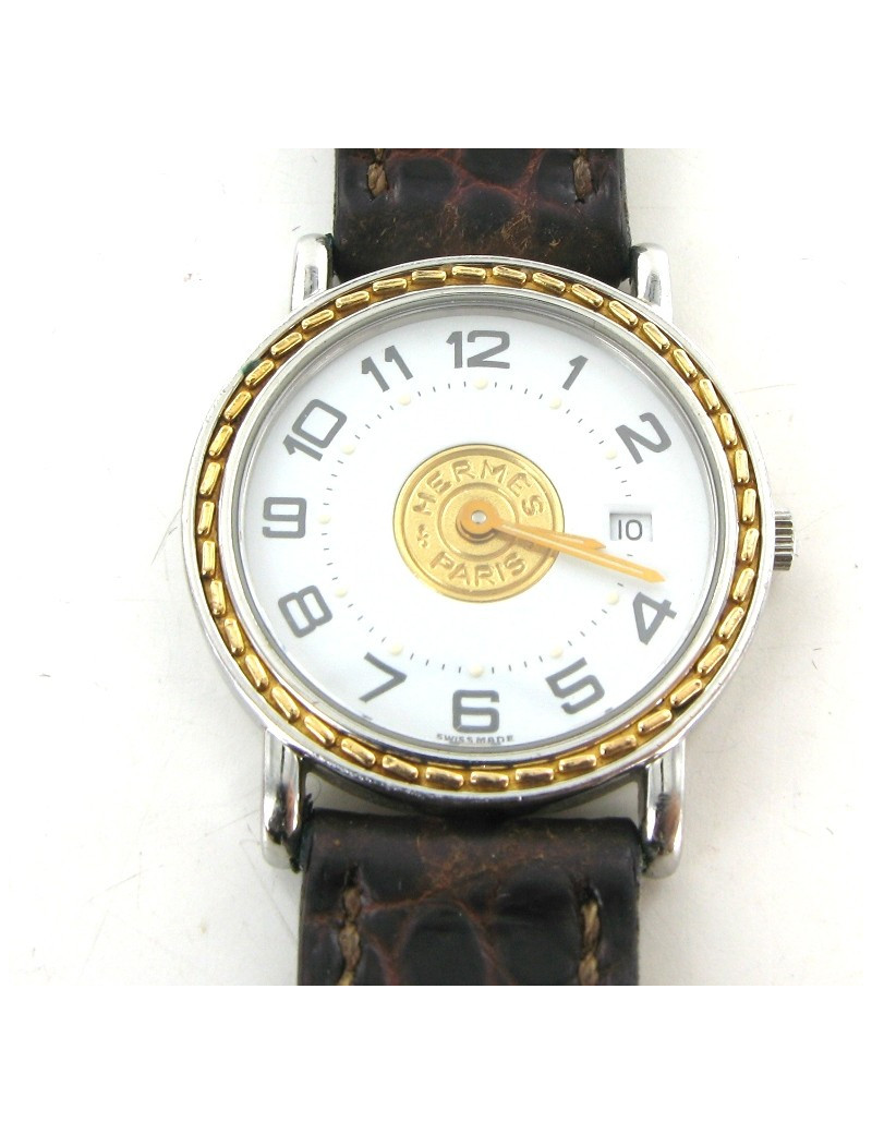 Montre HERMES sellier vintage en or et crocodile marron