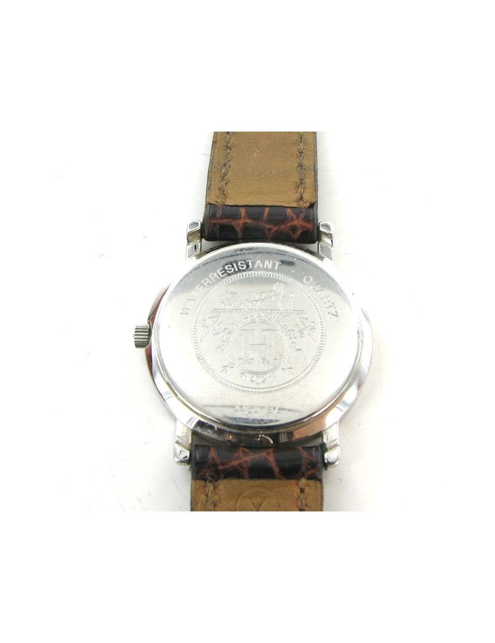 Montre HERMES sellier vintage en or et crocodile marron