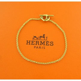 Bracelet mini chaîne d'ancre HERMES en or jaune