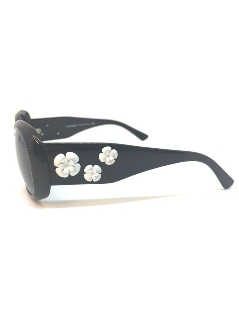 Lunettes de soleil CHANEL noires et camélia blanc