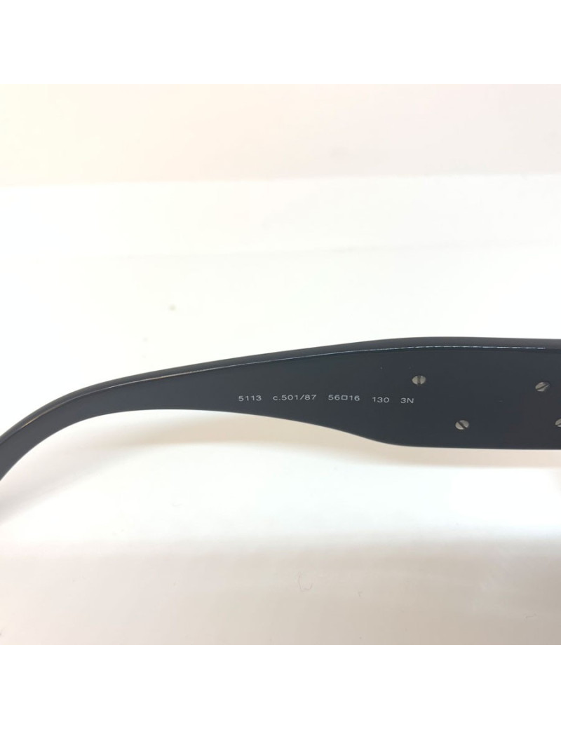 Lunettes de soleil CHANEL noires et camélia blanc