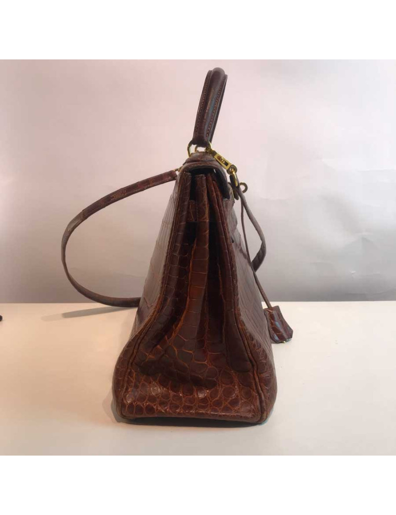Kelly 32 alligator mat marron bijouterie or