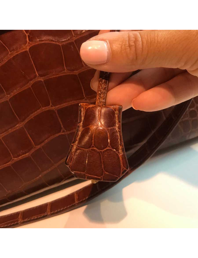 Kelly 32 alligator mat marron bijouterie or