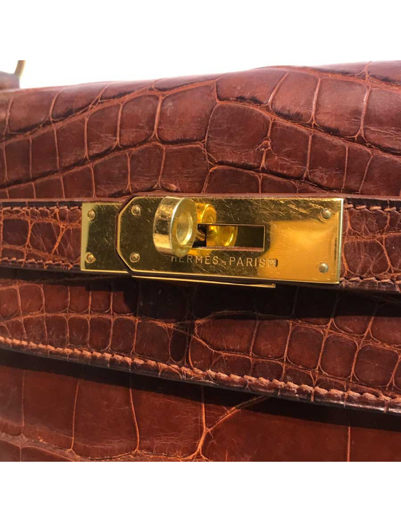 Kelly 32 alligator mat marron bijouterie or
