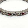 3 Bracelets CHANEL métal argent perles nacrées et rubis