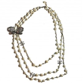 Sautoir Chanel perles et strass noeud papillon