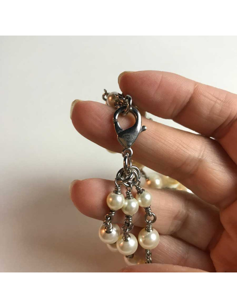 Sautoir Chanel perles et strass noeud papillon