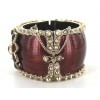 CHANEL cuff in gilded metal and varnished resin