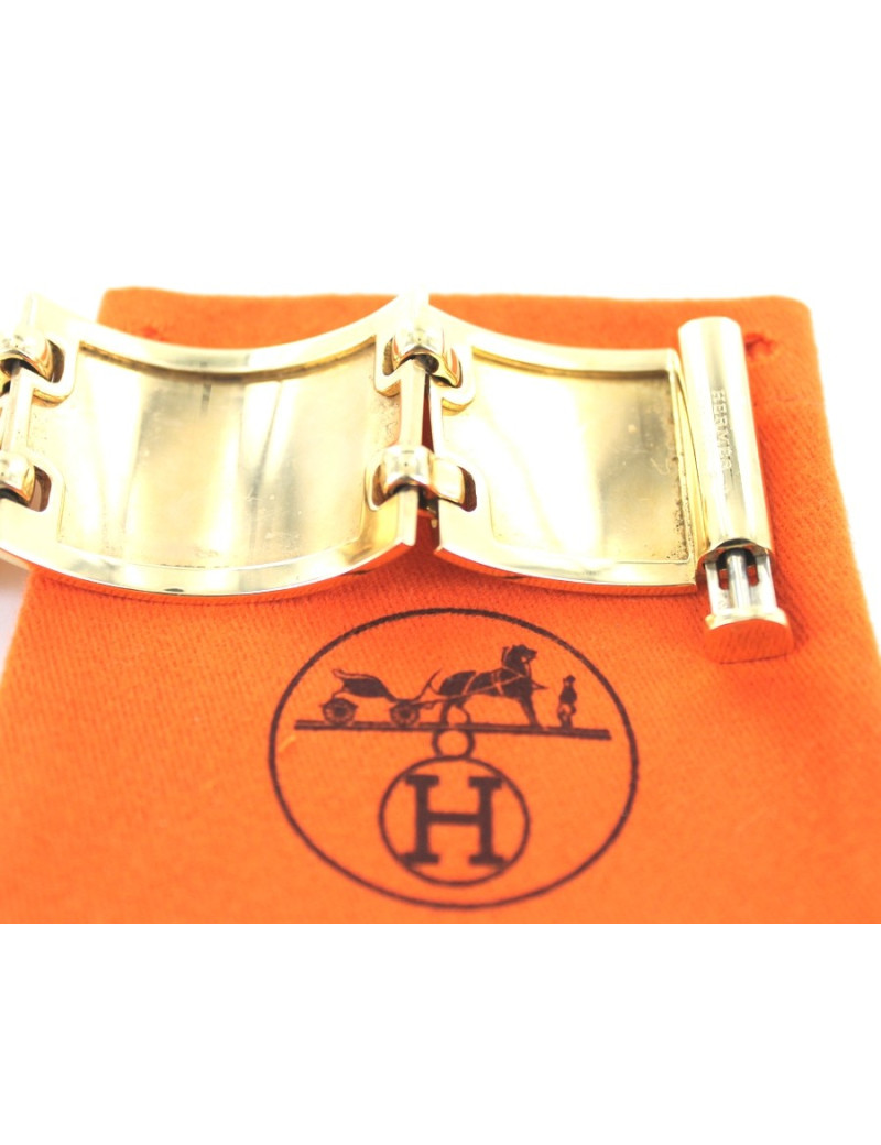 Manchette HERMES articulée en or massif 