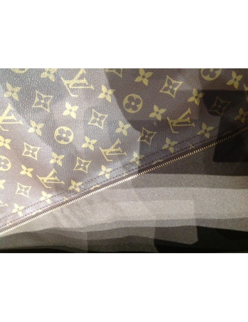 Cover carries LOUIS VUITTON Monogram Canvas clothes