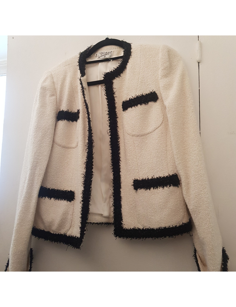 Veste vintage blanche gansée de noir