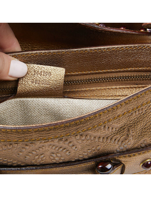 Sac à main GUCCI cuir embossé doré