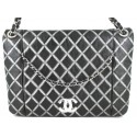 CHANEL bag in quilted black leather and silver sequins