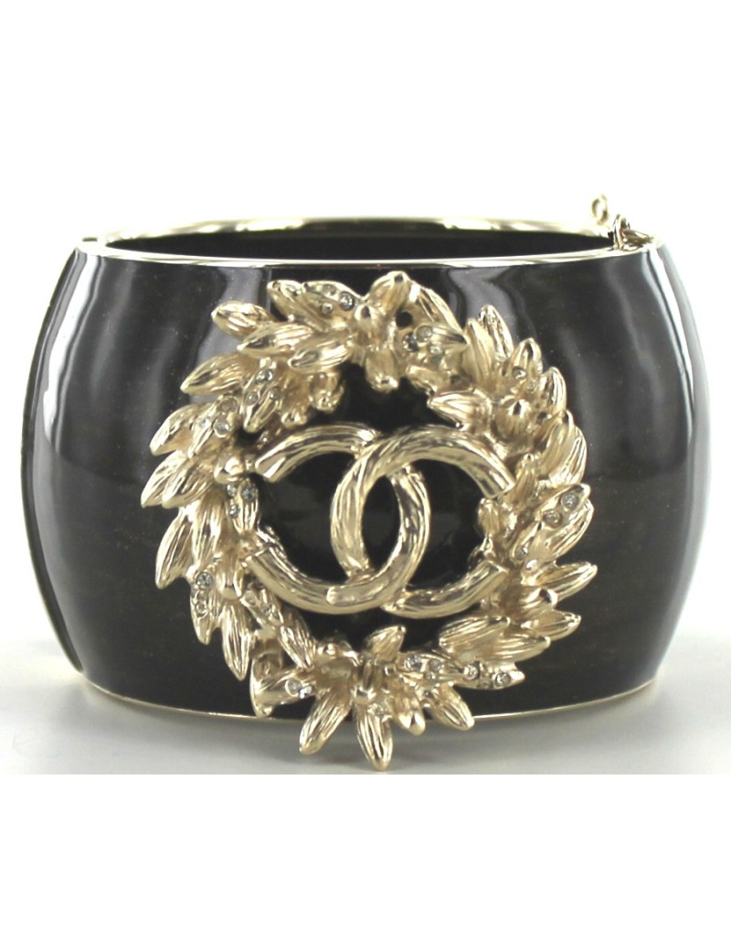 Manchette CHANEL en résine et bijou feuilles d'or pâle