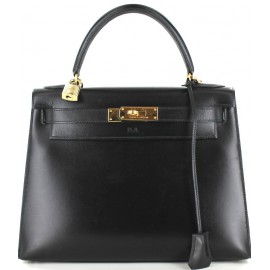 Kelly 28 HERMES leather black box and Golden jewellery