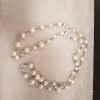 Sautoir long CHANEL perles et CC strass