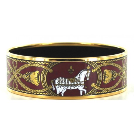 Bracelet HERMES en émail bordeaux et doré motif chevaux